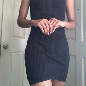 Slim black asymetrical mini dress